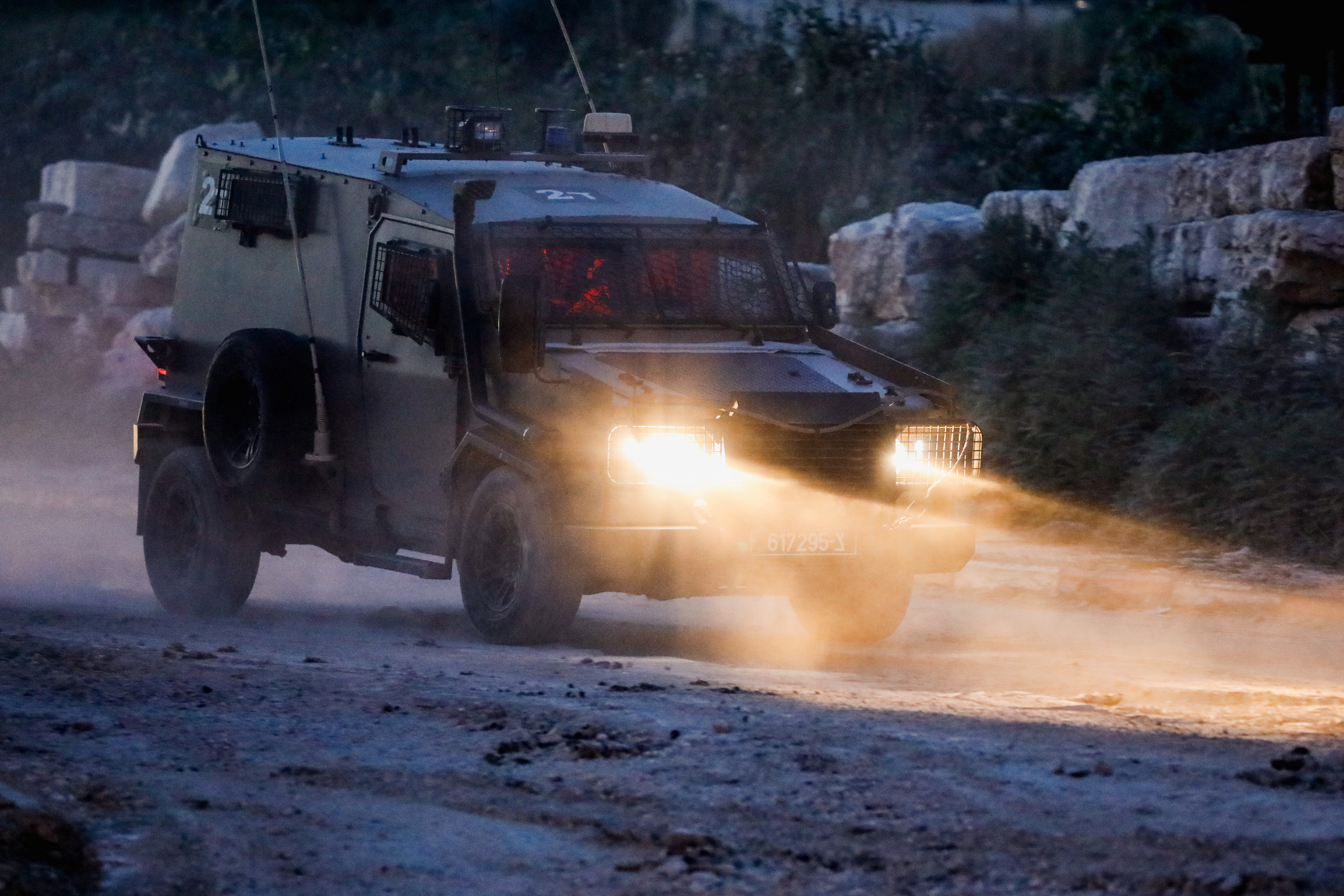 An Israeli military vehicle drives in Tulkarm, in the Israeli-occupied West Bank, April 19, 2024. REUTERS/Raneen Sawafta