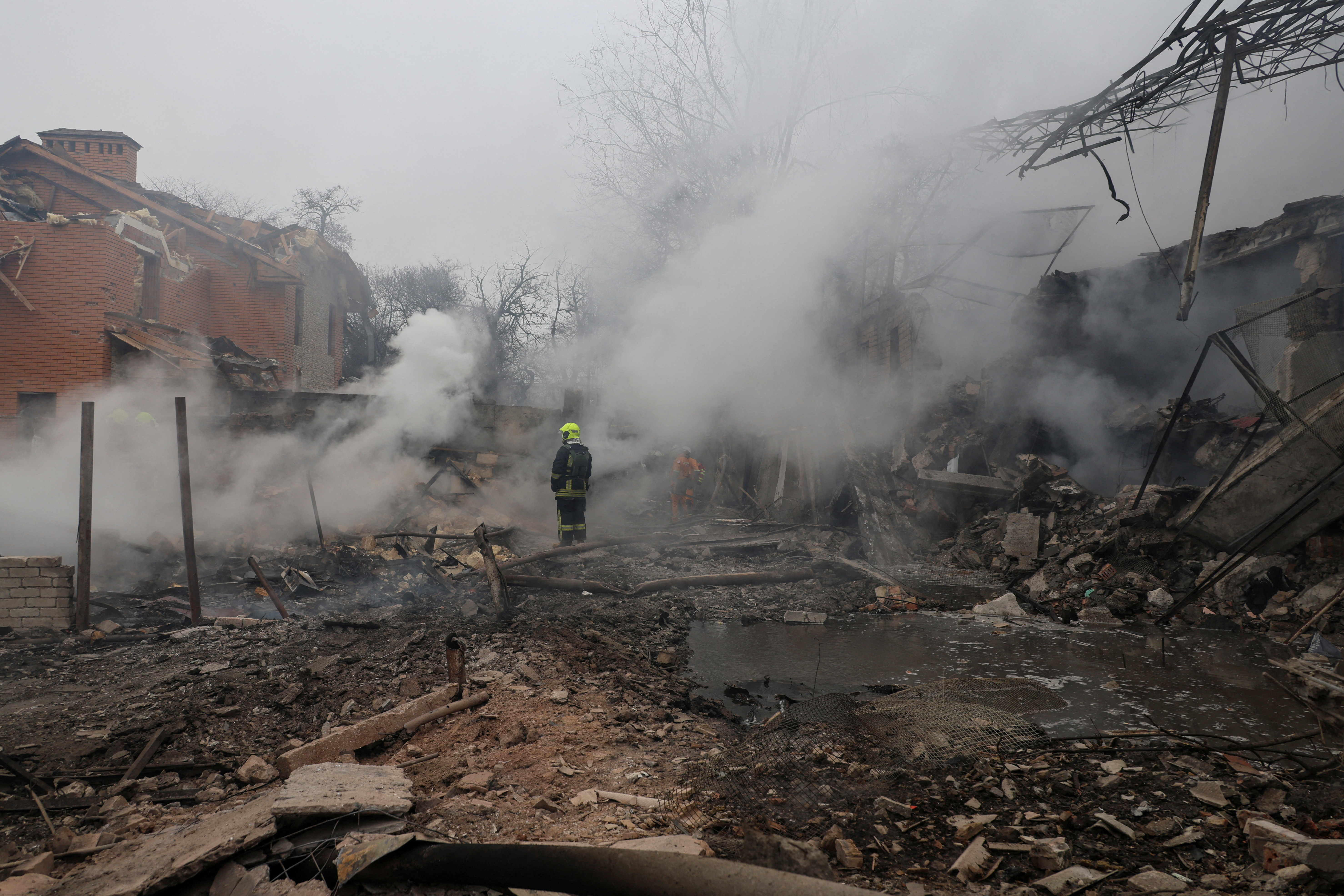 A rescuer stands in a residential area hit by a Russian missile strike, amid Russia's attack on Ukraine, in Odesa, Ukraine March 15, 2024. REUTERS/Stringer TPX IMAGES OF THE DAY
